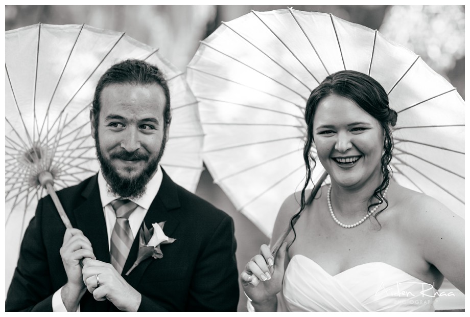 bride groom umbrellas