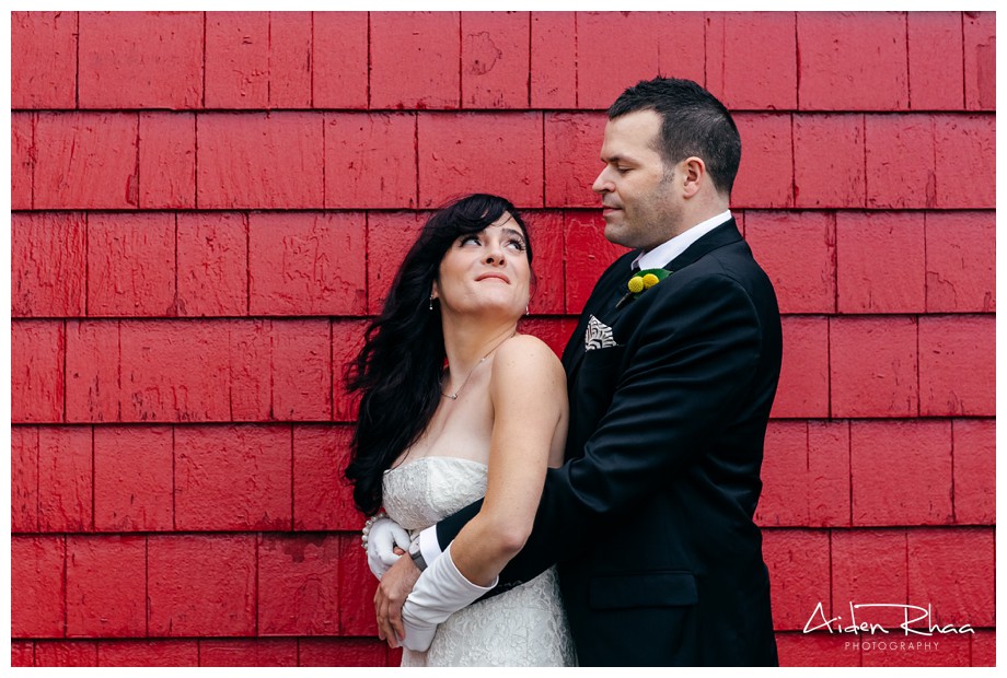 red wall wedding portrait